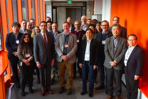 group photo of men and women standing